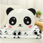 Liefdevolle panda pluche met deken in een bank