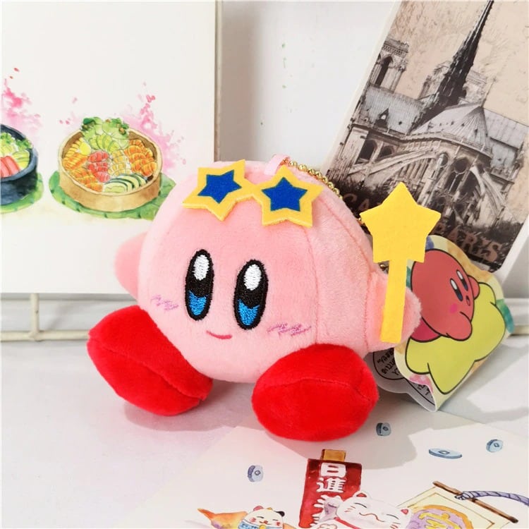 Kirby roze pluche met blauwe sterren op het hoofd