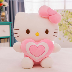 Hello Kitty pluche met een hart zittend op een tafel